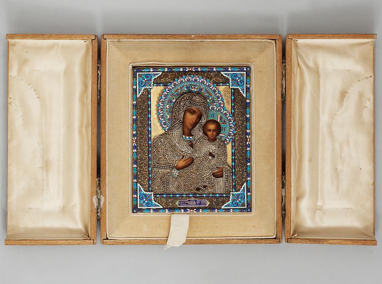 A RUSSIAN SILVER-GILT AND ENAMELD ICON, unidentified makers mark, Moscow 1895. Original box/cover.