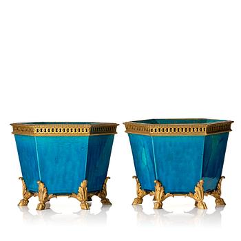 A pair of turkoise bronze mounted flower pots, late Qing dynasty.