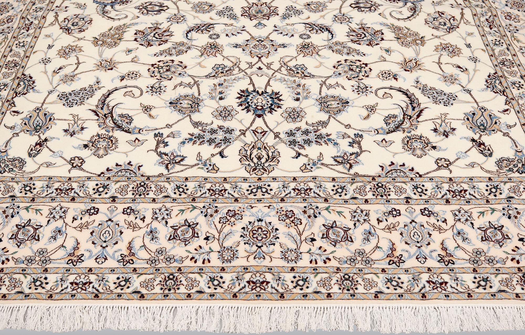 A part silk Nain carpet, so called 6LAA, ca 354 x 250 cm.