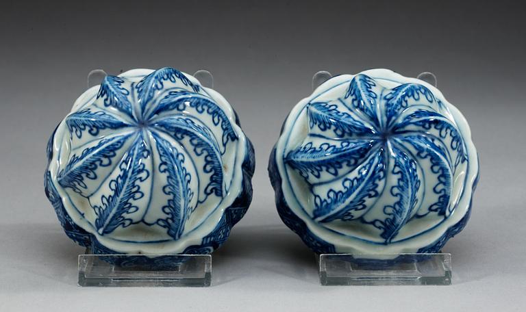A pair of blue and white dessert moulds, Qing dynasty, Qianlong (1736-95).