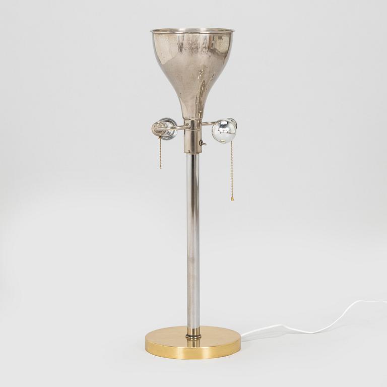 A mid-20th century floor/tablelamp, France.