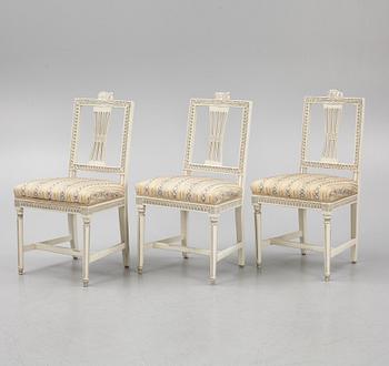 A sofa, three chairs and a table, Gustaivan style and of the Gustavian period, 19th-20th century.