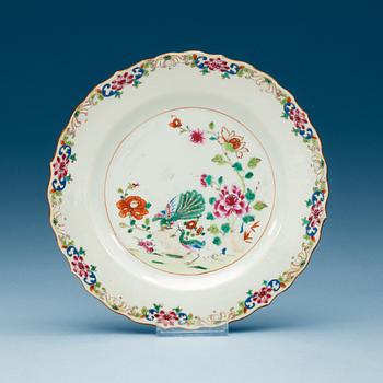 1542. A set of eight famille rose plates, Qing dynasty, Qianlong (1736-1795).