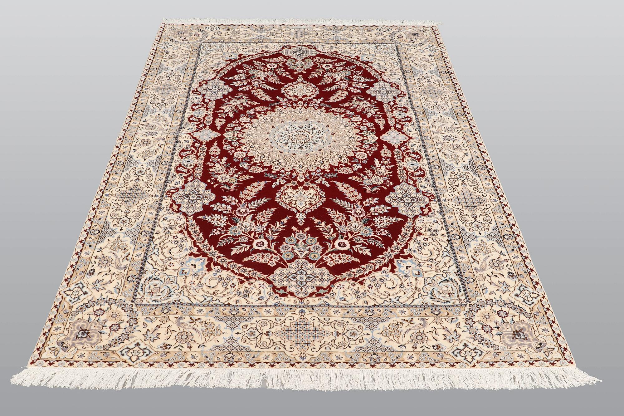 A carpet, Nain part silk s.k 6LAA, 239 x 155 cm.