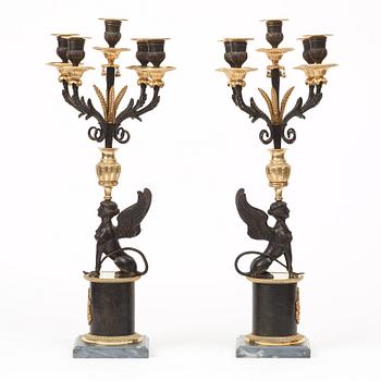 A pair of Russian Louis XVI-style 19th century five-light candelabra.