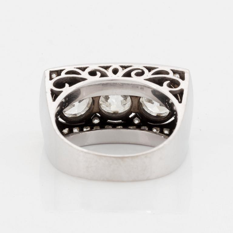 An 18K white gold ring set with old- and eight-cut diamonds.