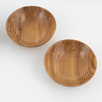 Magnus Ek, a set of seven ash wood plates for Oaxen Krog, 2021.