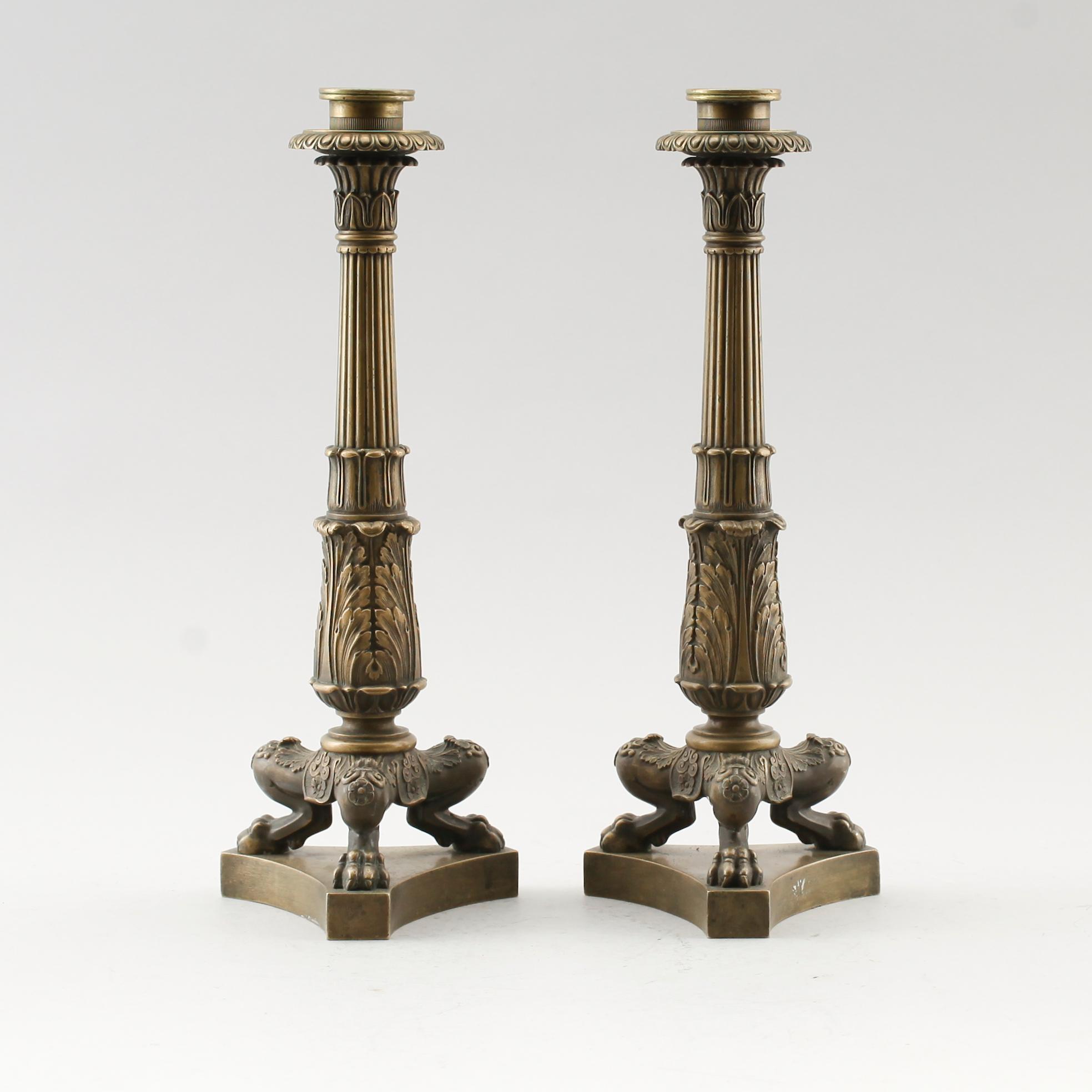 LJUSSTAKAR, 1 par, brons, senempire, omkring år 1830.