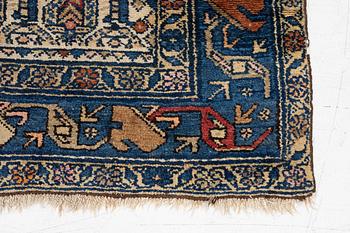An antique Hamadan rug, c. 188 x 114 cm.
