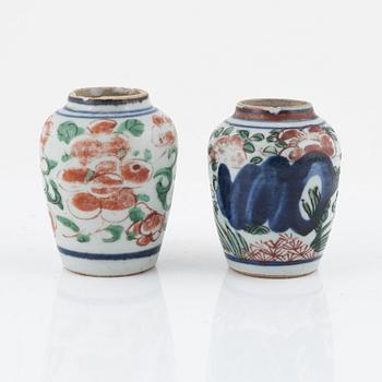 A pair of porcelain miniature urns, China, Ming dynasty, (1364-1644).