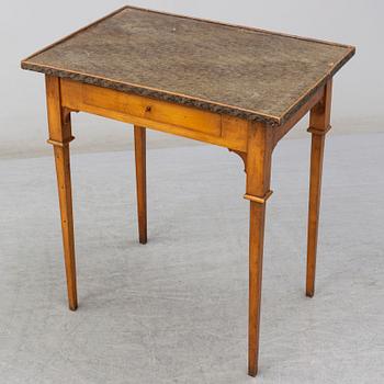 A Swedish late gustavian table. First half of the 19th century.