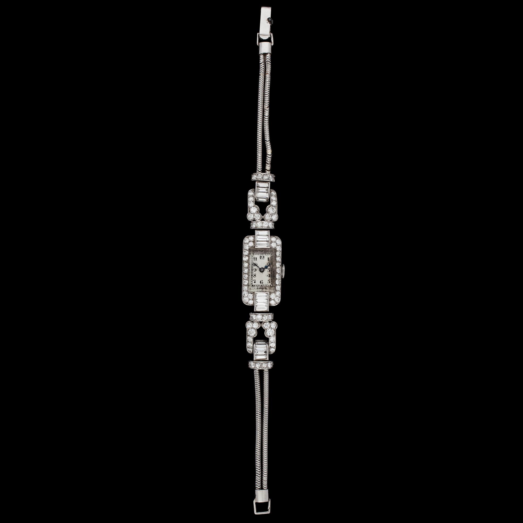 A diamond ladie's wrist watch, tot. app. 4 cts.