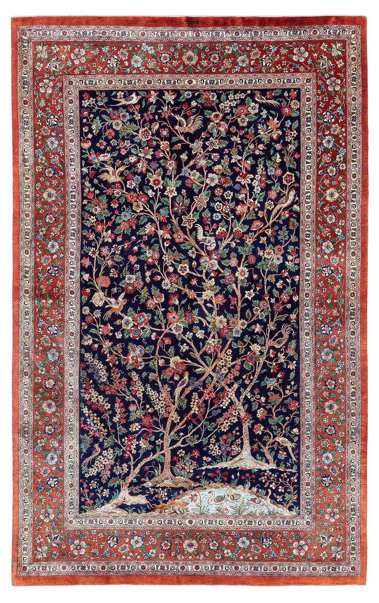 A signed pictoral silk Qum rug, c. 203 x 127 cm.