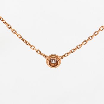 Cartier, an 18K gold 'd'Amour' necklace, with a brilliant-cut diamond.