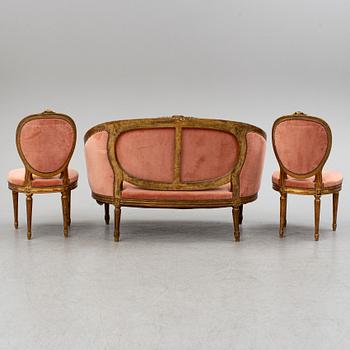 A sofa and a pair of chairs, Louis XVI-style, late 19th century.