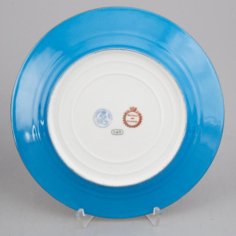 A set with two porcelain tazzas and 15 plates, France, "Sevrès", late 19th Century.