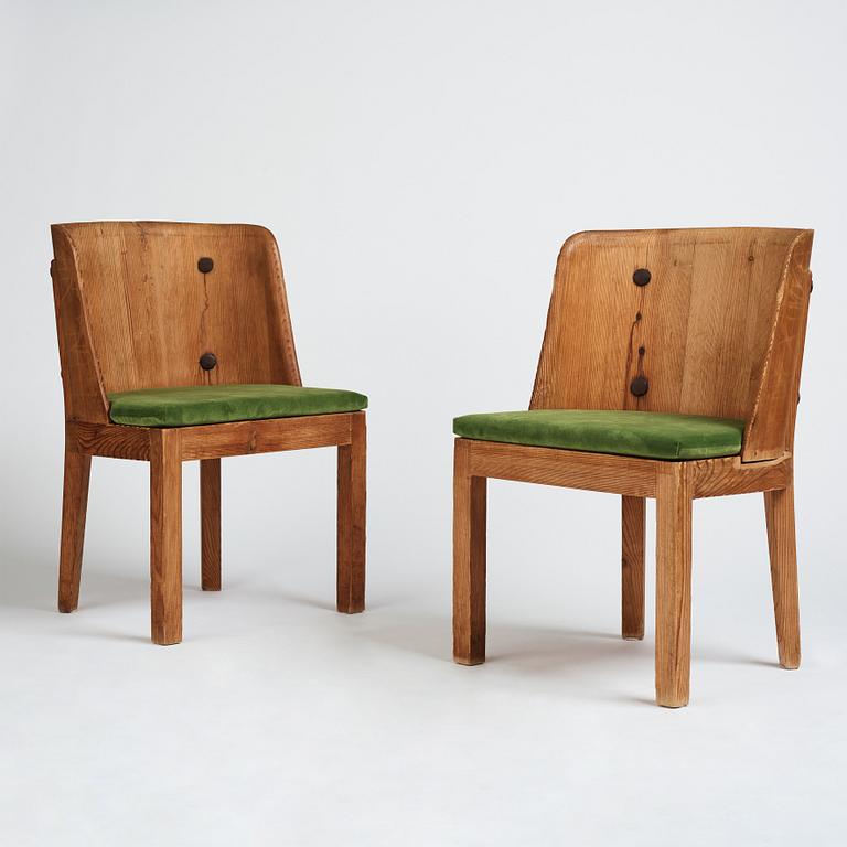 Axel Einar Hjorth, a pair of stained pine 'Lovö' chairs, Nordiska Kompaniet Sweden 1930s.