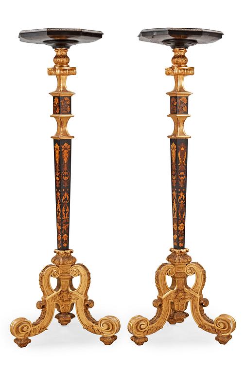 A pair of French Baroque circa 1700 candle stands.