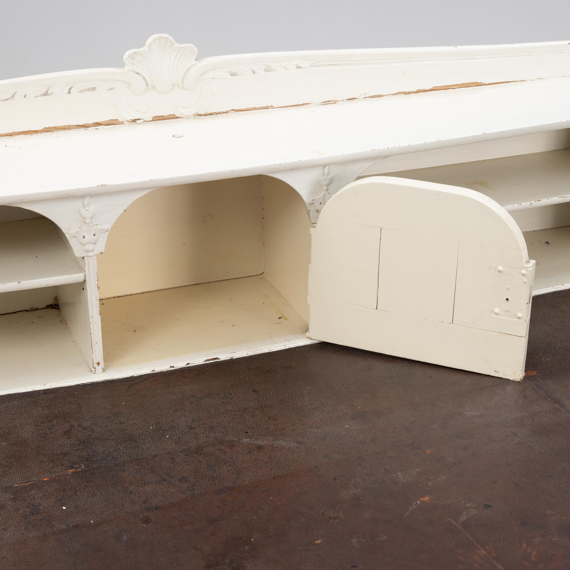 A painted rococo writing desk, mid 18th Century with later parts.