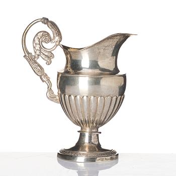 A Swedish parcel-gilt silver cream-jug, mark of Johan Petter Grönvall, Stockholm 1831.