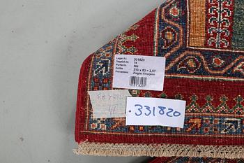 A runner carpet, Khorjin, ca 310 x 83 cm.