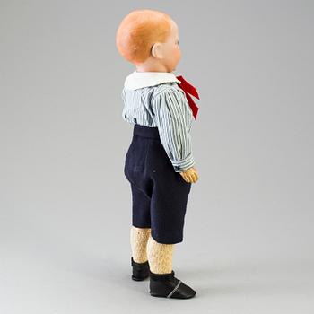 A bisque head character doll marked 226, probably France, 1910s.