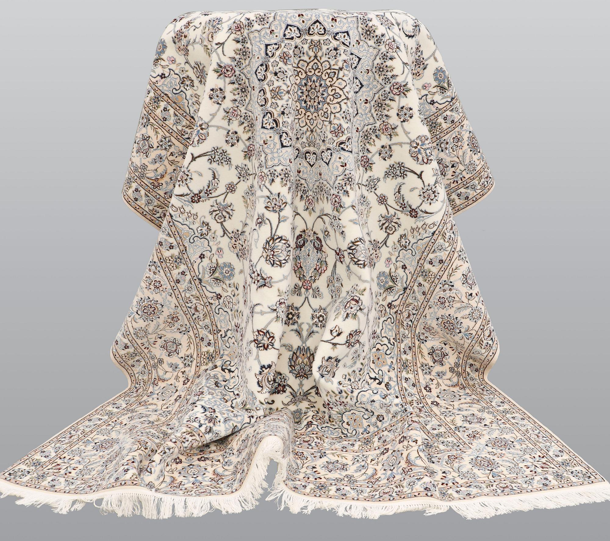 A carpet, Nain part silk s.k 6LAA, ca 310 X 209 cm.