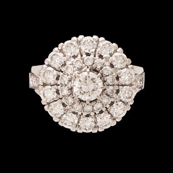 An 18K white gold ring/cocktail ring with round brilliant-cut diamonds, Petterssons Eftr Juvelerar Ab Joh Stockholm 1945.