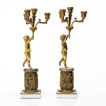 A pair of Empire style candelabra, circa 1900.