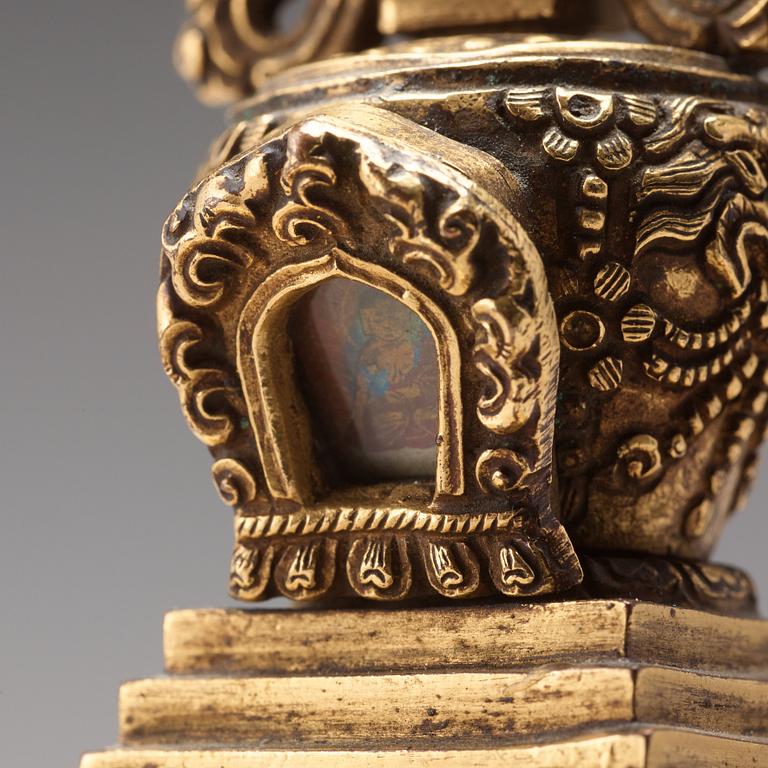 Two Tibetan gilt copper alloy stupa's, 19th Century.