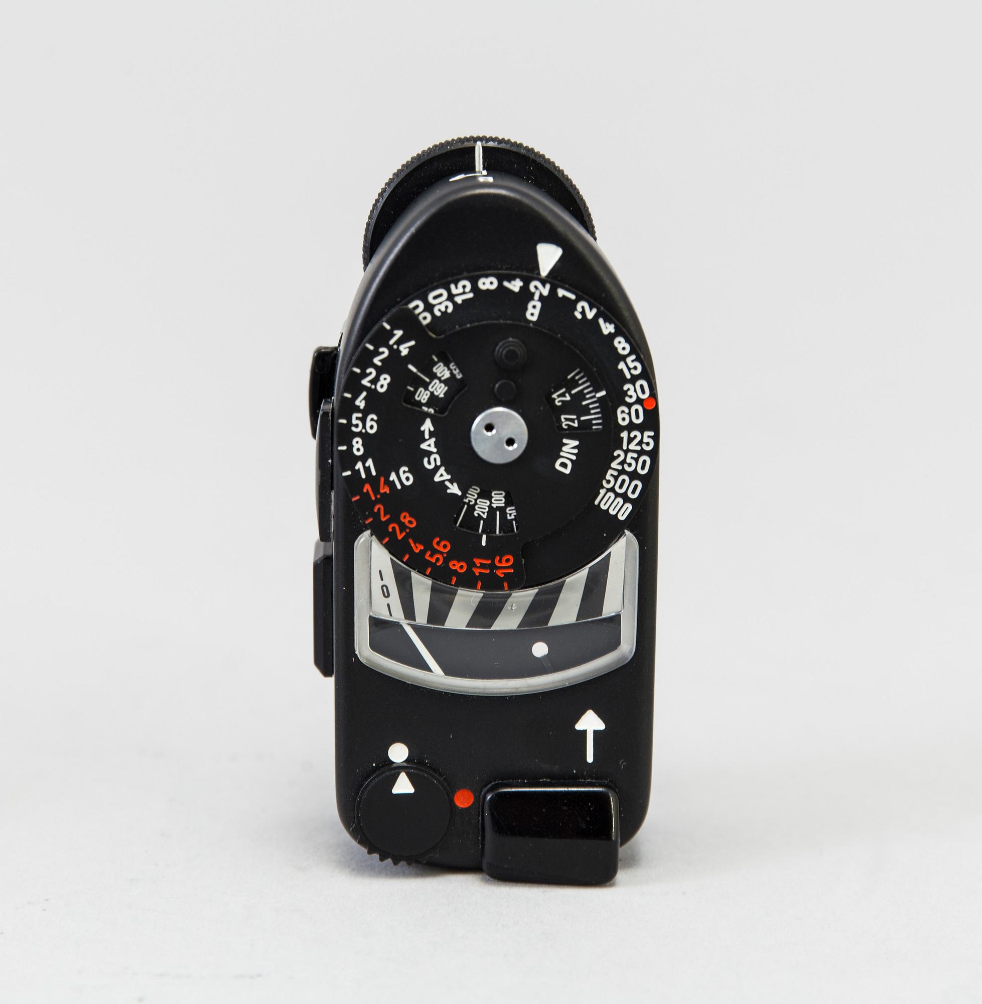 a black body Leica M4-P camera with no 1605951 made by Leitz Canada in 1982. With two lenses and a Leica Meter.