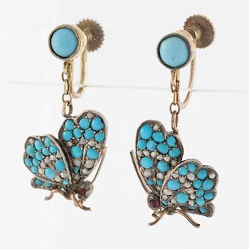 Brooch/pendant and earrings, in the form of butterflies, silver with turquoises and pearls.