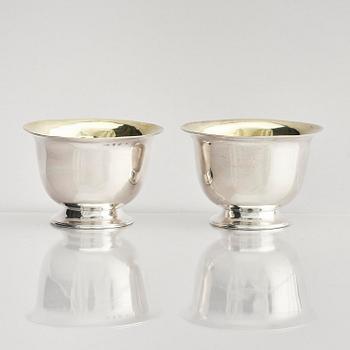 A pair of Swedish parcel-gilt silver dessert bowls with stand, mark of Gustaf Möllenborg, Stockholm 1830.