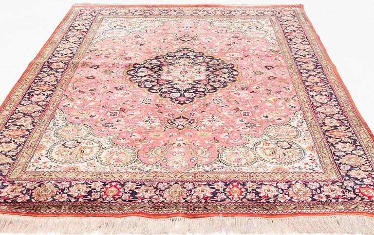 A Carpet, Silk Gohm, circa  298 x 202 cm.