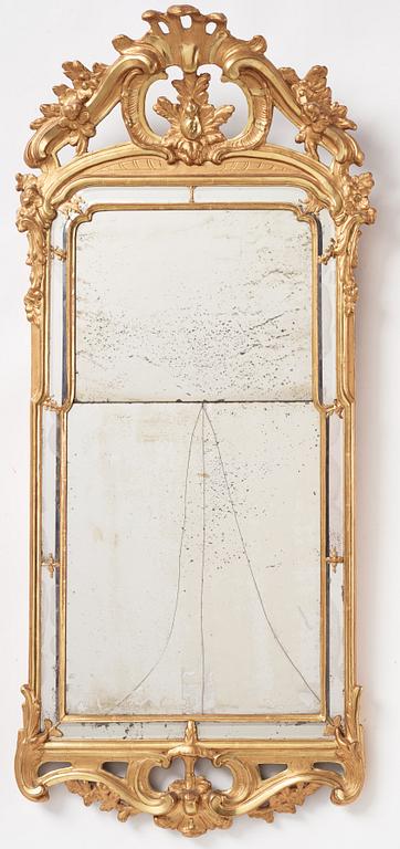 A Rococo giltwood mirror by N. Meunier (master in Stockholm 1754-97).