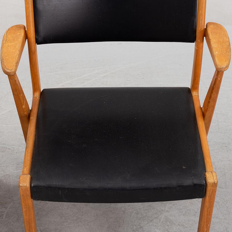 A pair of 1950's/60's armchairs.