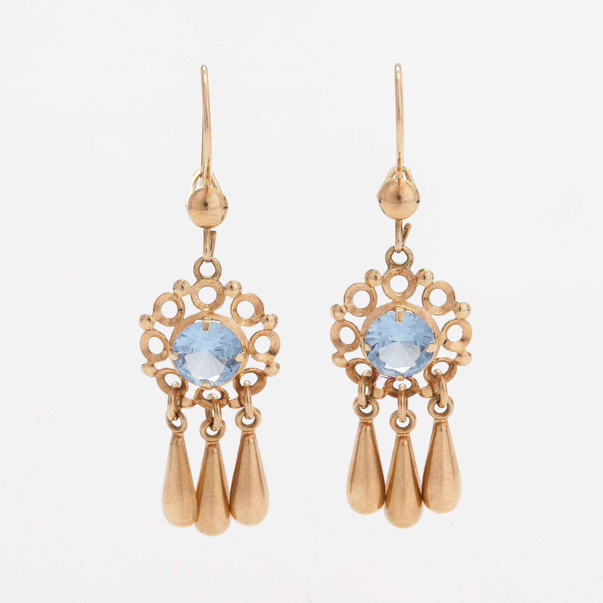 A pair of 14K gold earrings with synthetic spinels.