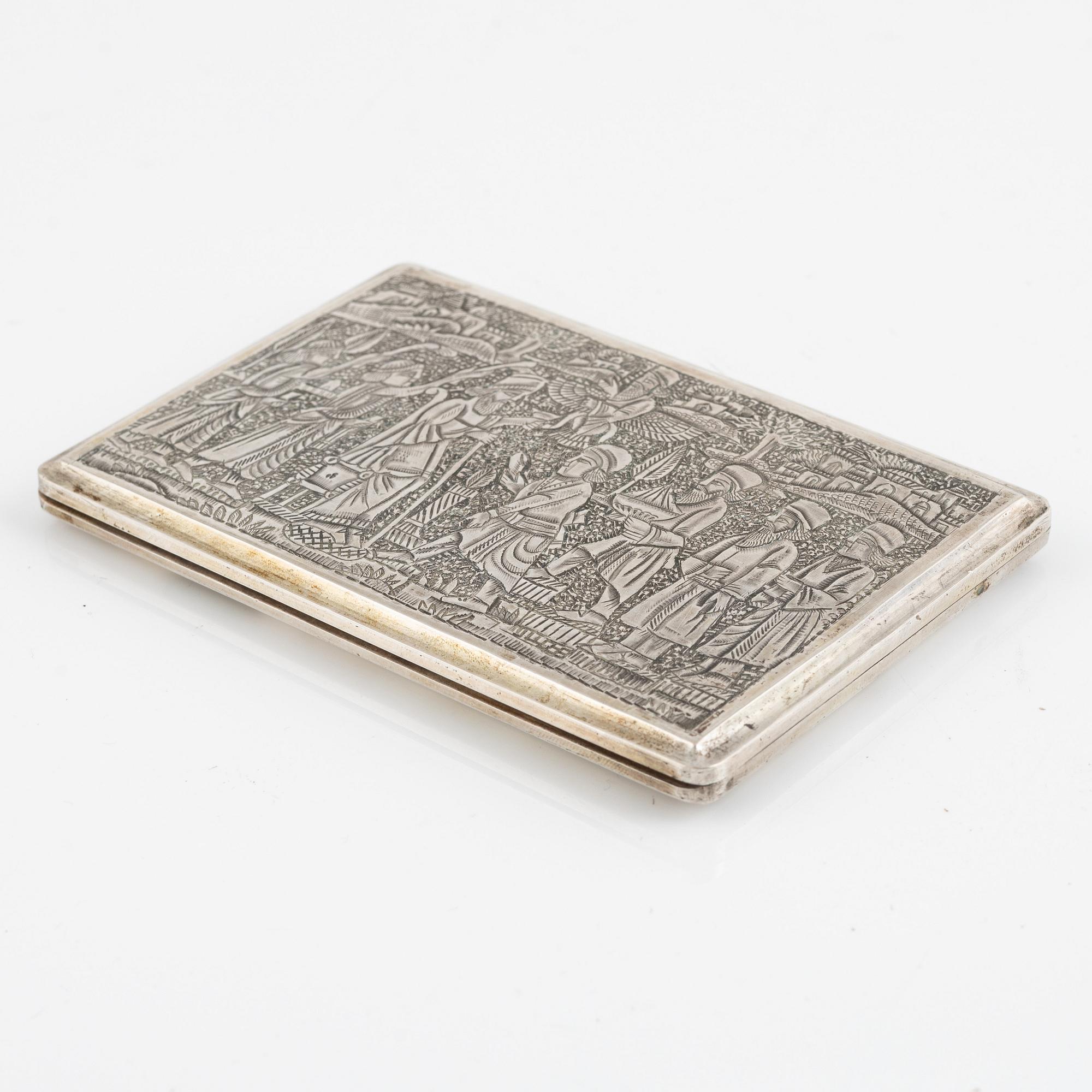 A silver cigarette case, Iran, first half of the 20th Century.