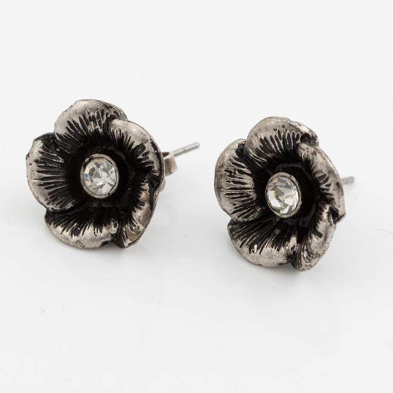 Necklace with matching earrings, white metal in floral design with glass stones.