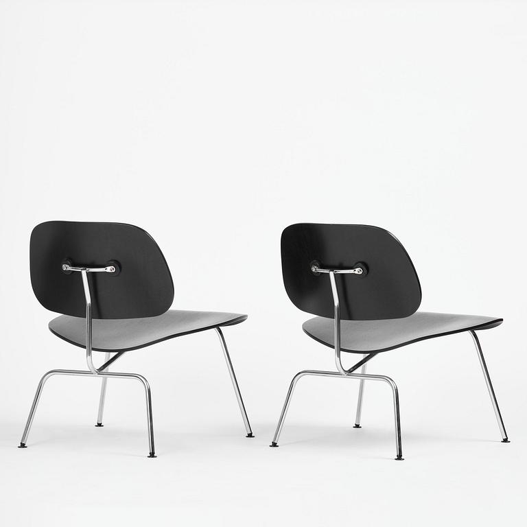 Charles & Ray Eames, a pair of "DCM" chairs, Vitra, 1997.
