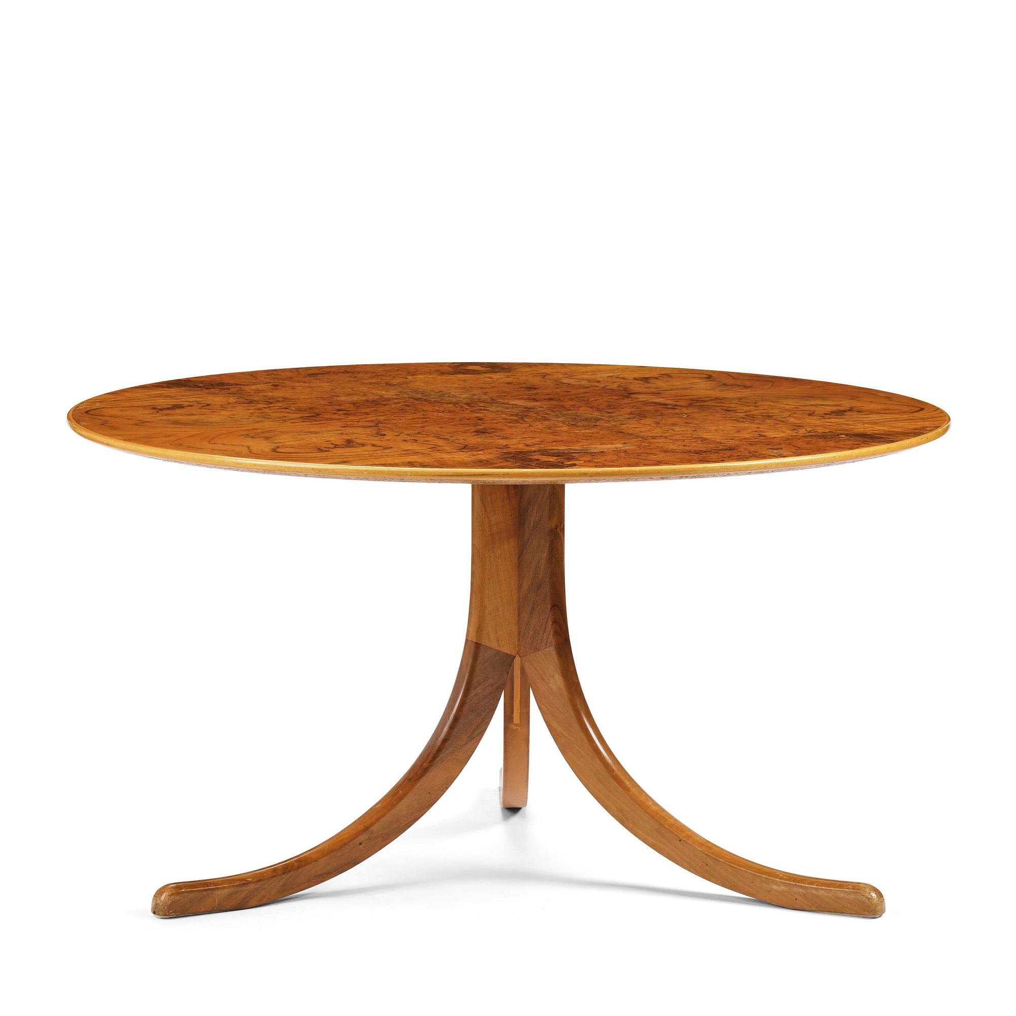 Josef Frank, a walnut veneered table model 1028, Firma Svenskt Tenn, pre 1985.