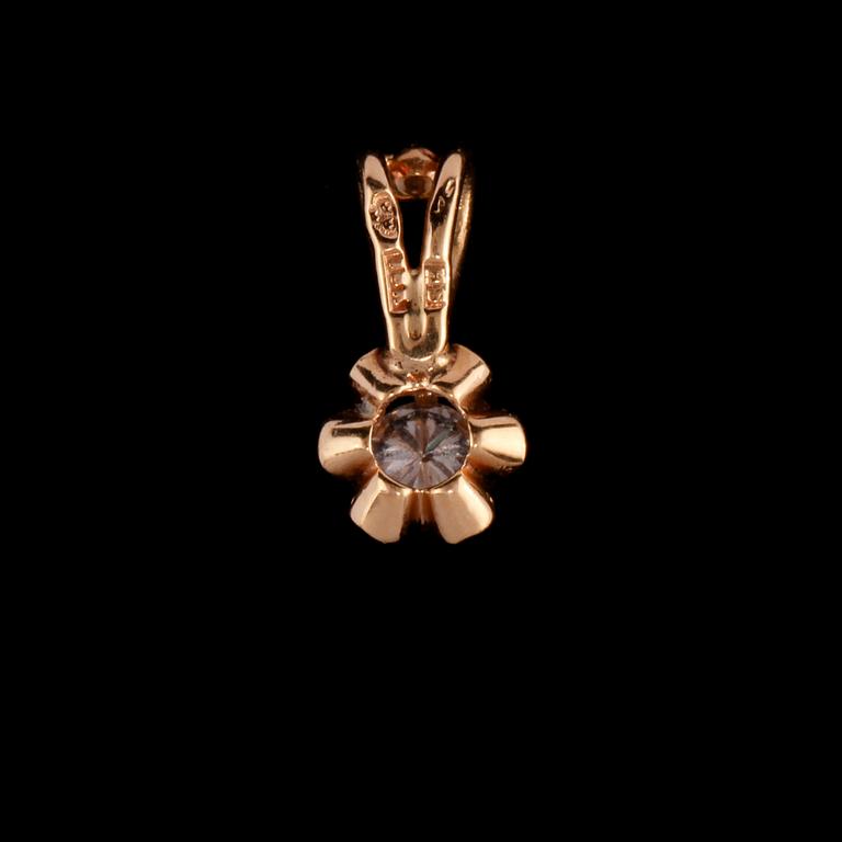 HÄNGE, 18k guld med briljantslipad diamant ca 0.10 ct, Hugo Strömdahl, Stockholm. Vikt 0,5 gram.
