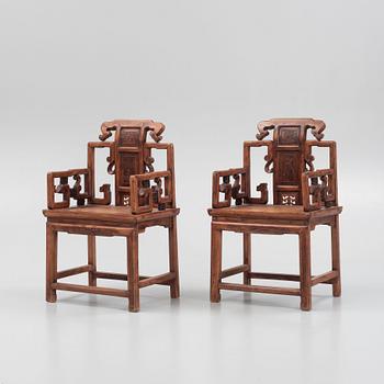 A pair of hardwood chairs, China, early 20th century.