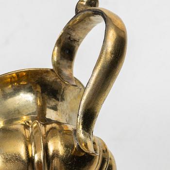 A Russian silver-gilt cream jug, Minsk, 1860s.