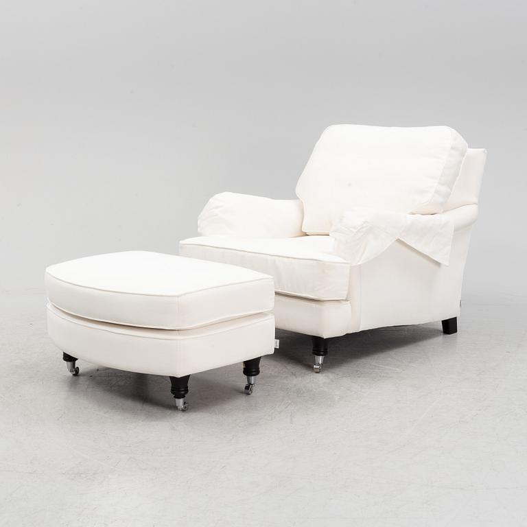 An easy chair with ottoman from Englesson, 21st century.