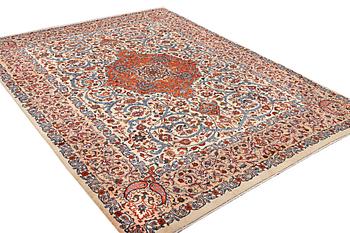A Kashmar carpet, c. 383 x 293 cm.