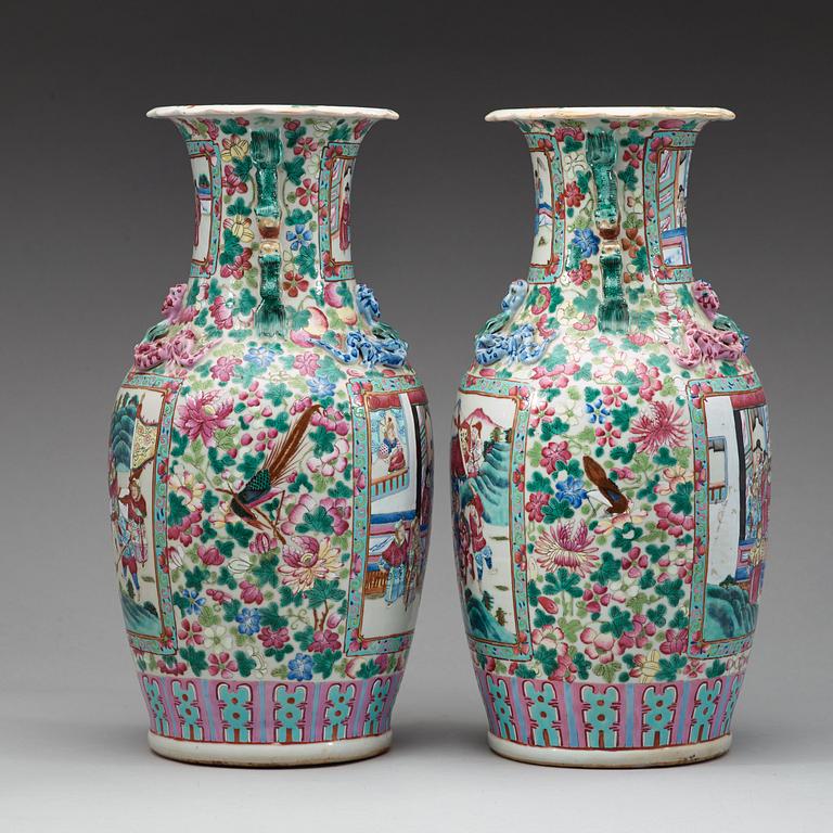 A pair of Canton famille rose vases, Qing dynasty, 19th Century.