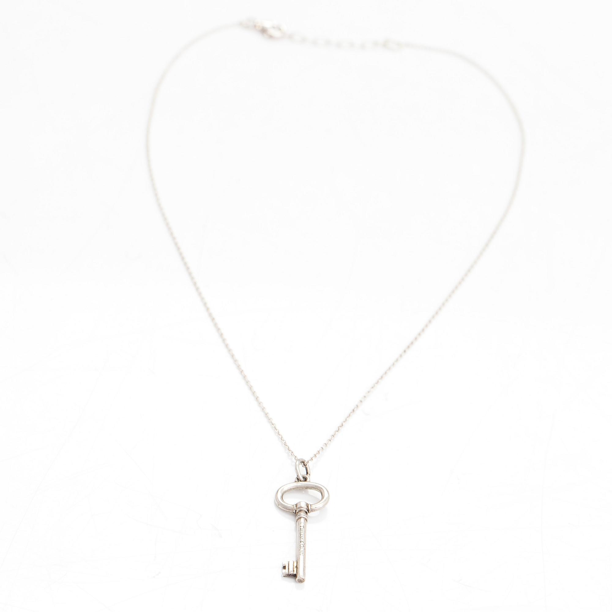 Tiffany & Co, A sterlingsilver pendant with chain.