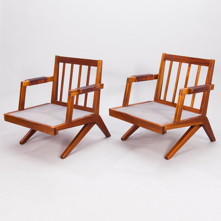 OLAVI HÄNNINEN, A 1960s 'Bumerang' armchairs for HMN Huonekalu Mikko Nupponen, Lahti, Finland.