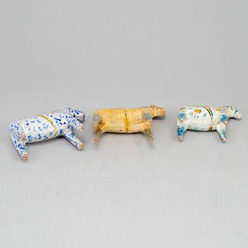 Five painted dalahästar, early 20th century.